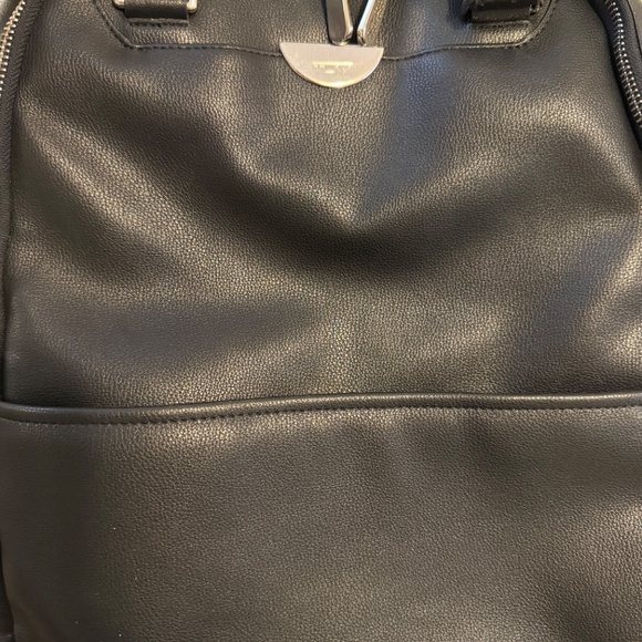 Tumi black leather style backpack- women